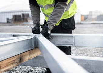 Byggarbetare som behöver finansiering för tillväxt